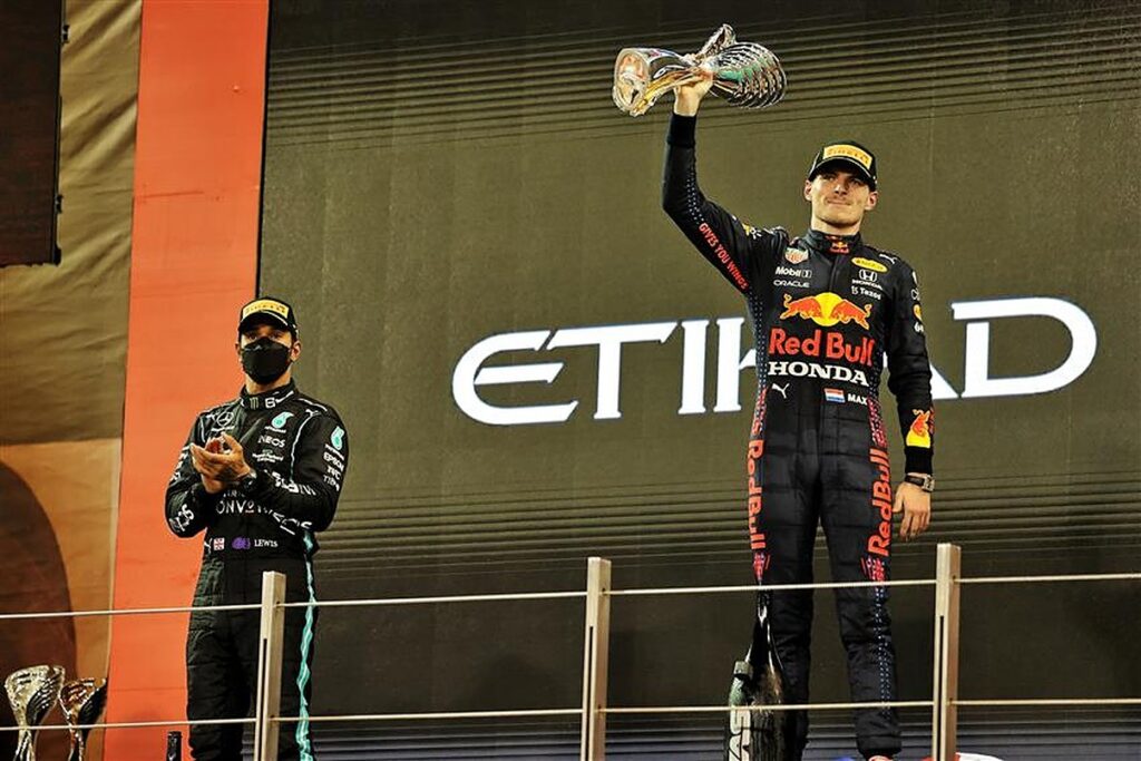 Max Verstappen and Lewis Hamilton on the 2021 Abu Dhabi GP podium.v1