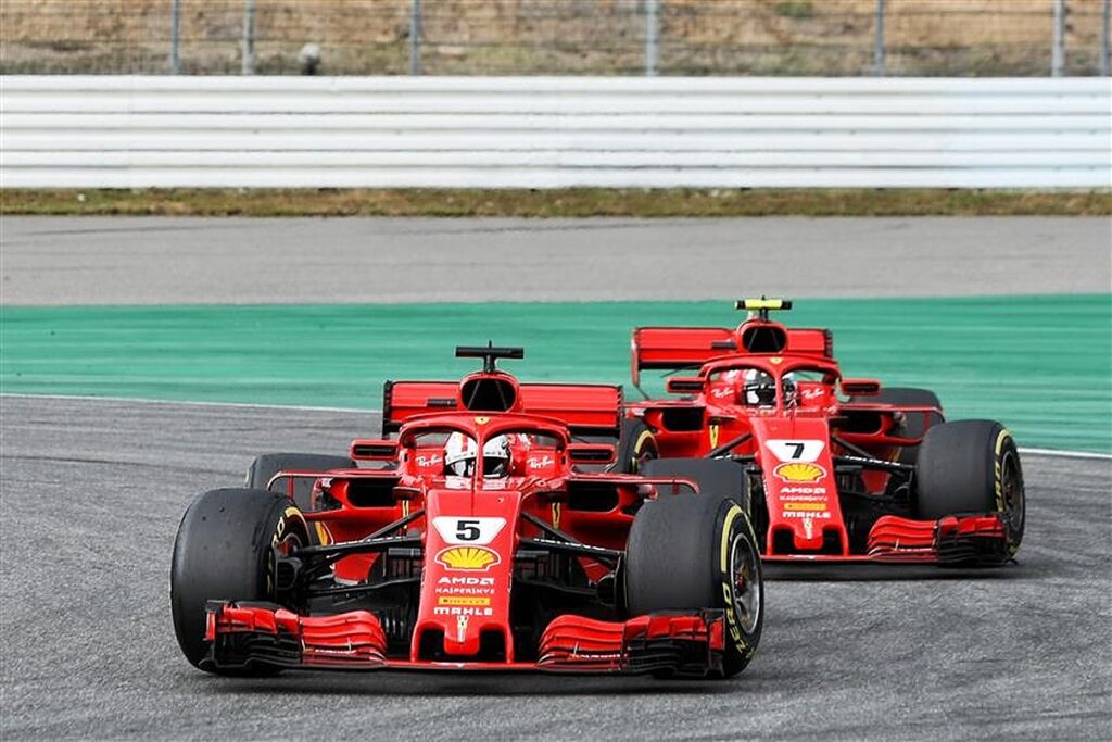 Sebastian Vettel and Kimi Raikkonen driver for Ferrari.v1